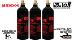 Three black 20 oz Maddog CO2 paintball tanks with red logos and safety warnings, shipped empty and compatible with standard paintball guns.