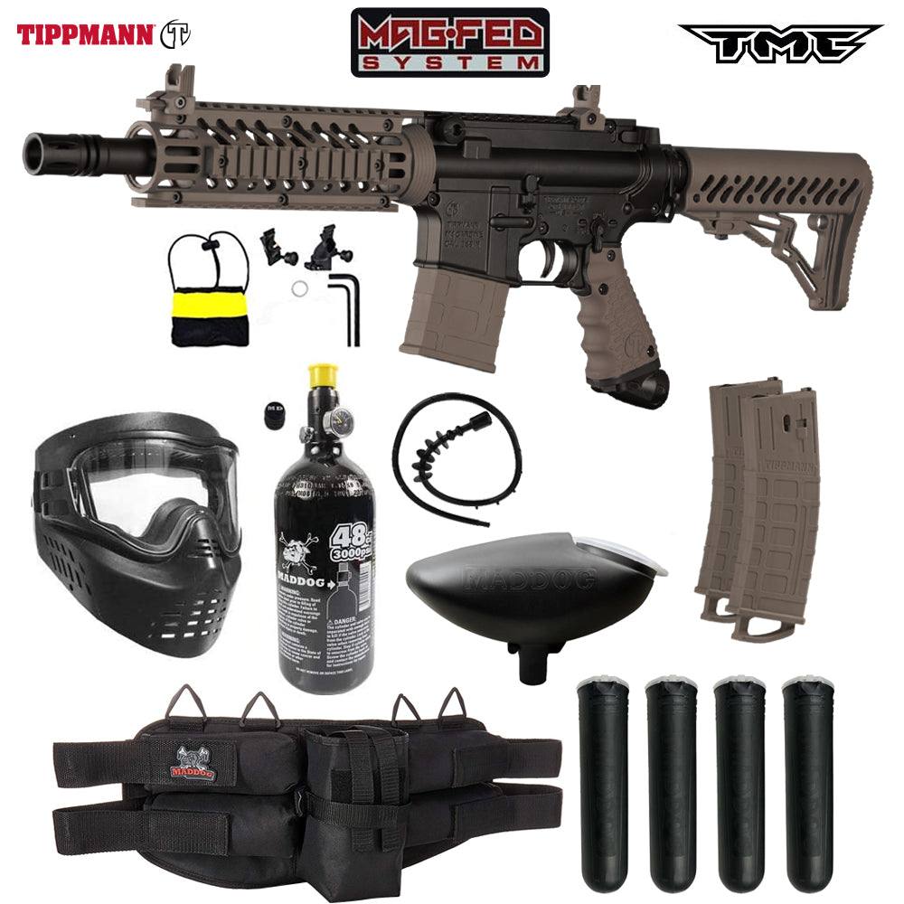 Tippmann TMC MAGFED paintball gun starter package with silver HPA tank, mask, loader, magazines, pods, and harness
