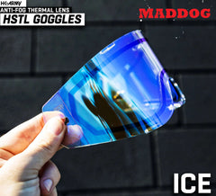 Maddog HK Army HSTL Goggle anti-fog thermal lens in blue ice color held against dark background